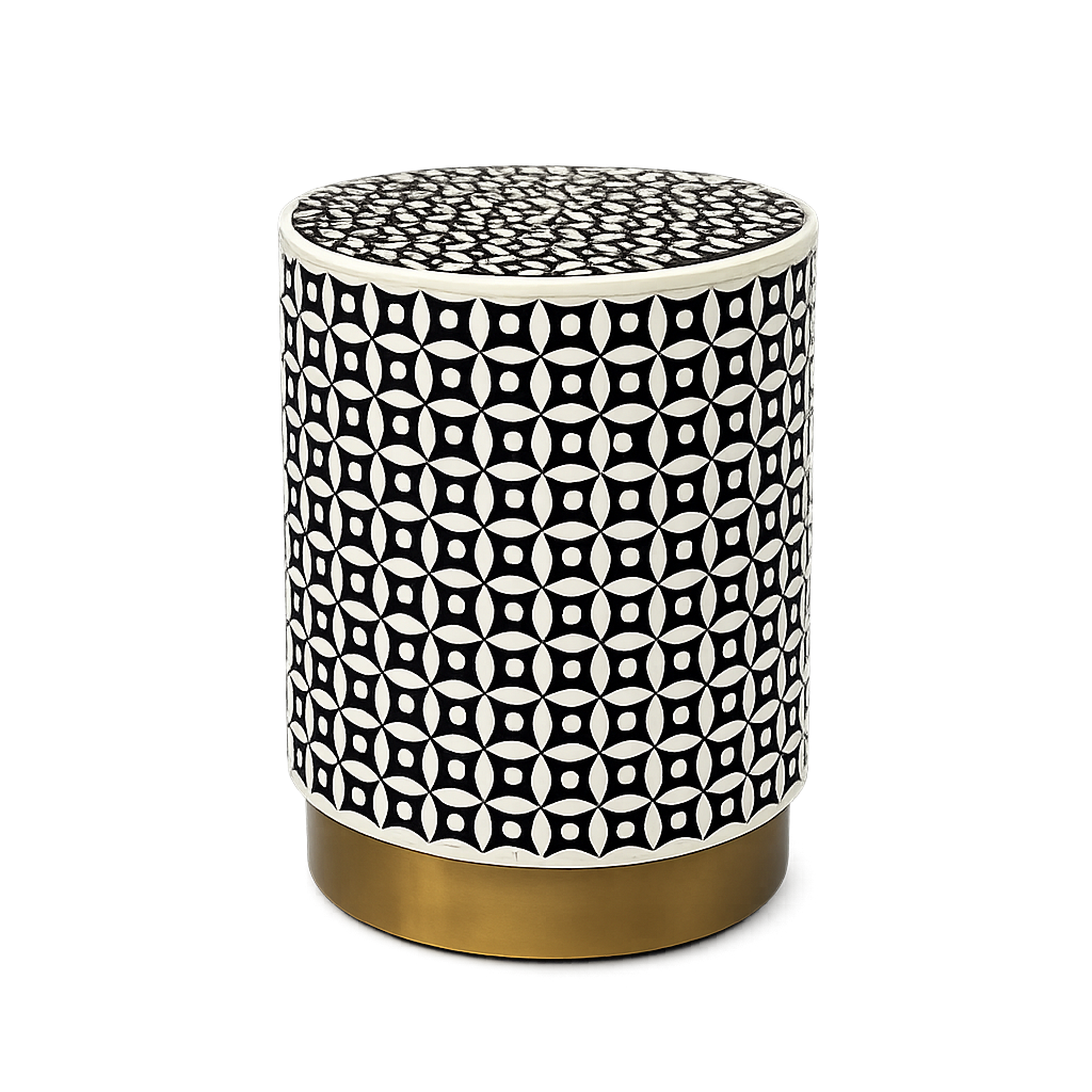 Round side table with black and white geometric pattern and gold base on a white background